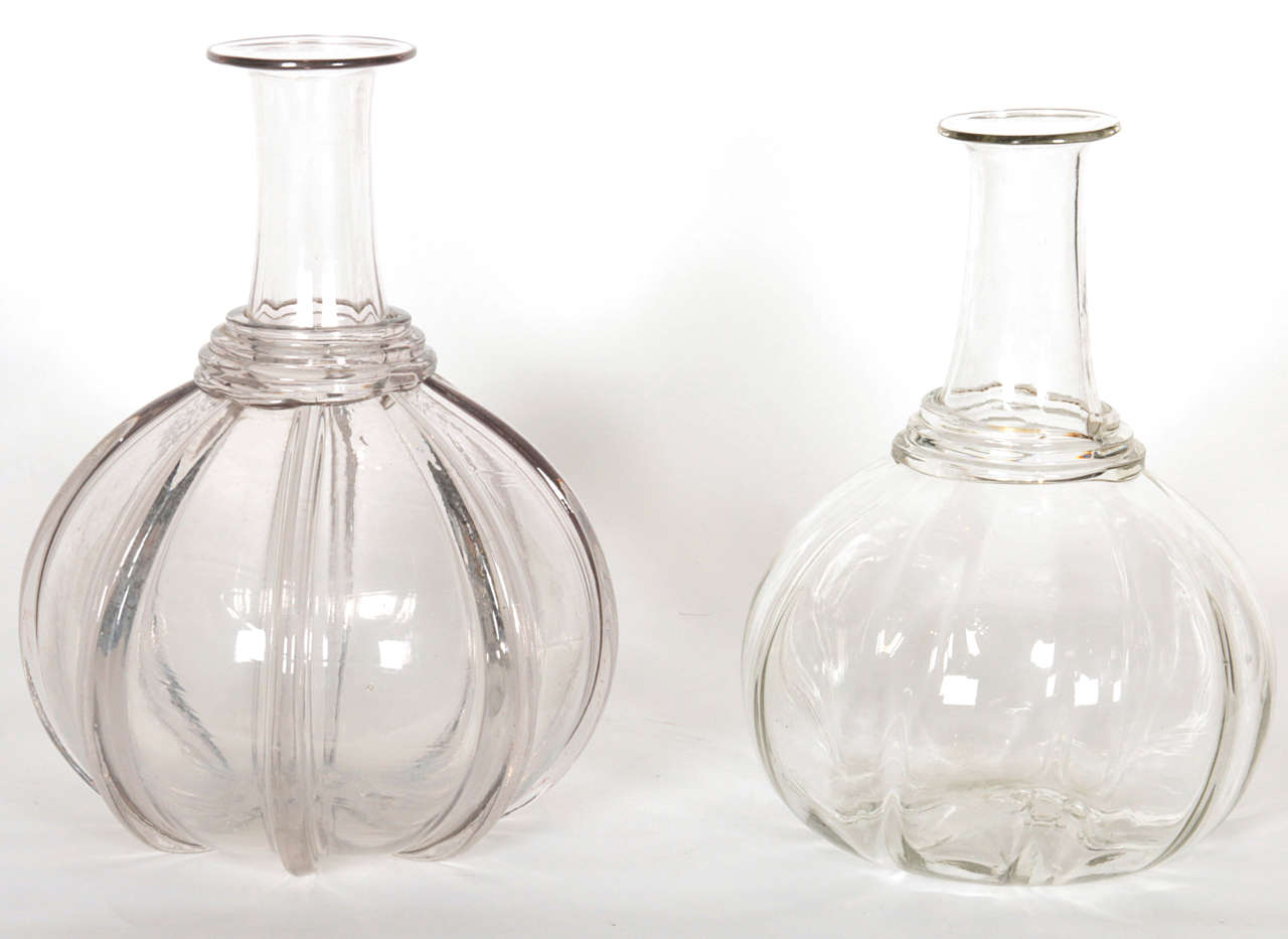 Swedish blown clear glass melon form carafes, 19th Century. Originally for water but make very nice wine carafes