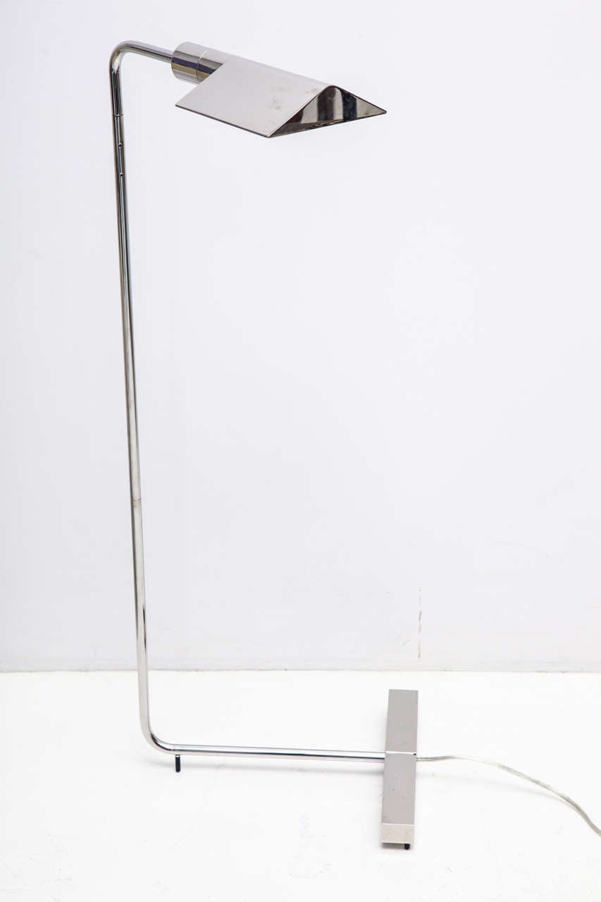 CEDRIC HARTMAN (b. 1929)
Chrome-plated brass floor lamp with 
dimmer switch and swiveling neck and head.
Signed.
American, c. 1970