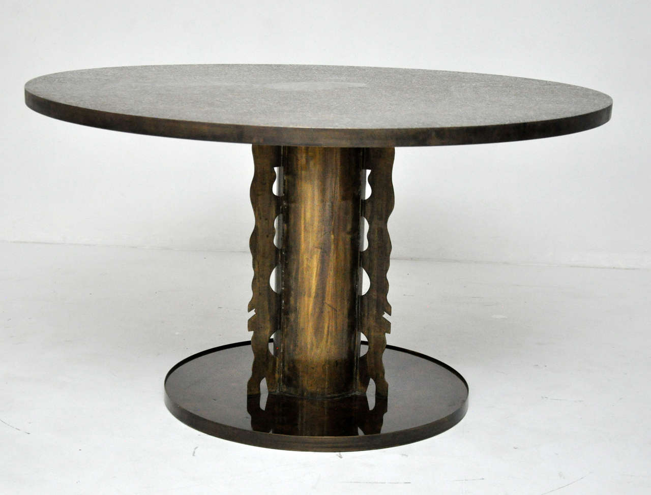 Dining or center table by Phillip and Kelvin Laverne. Etruscan pattern top in bronze.  Hand signed 