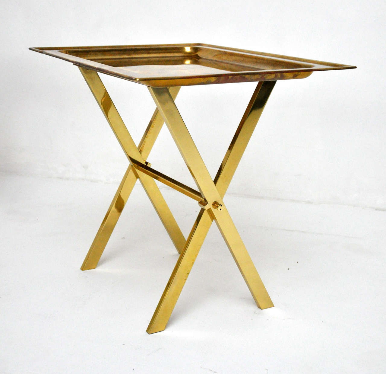 Collapsible brass tray tables. Made in Italy by Cenacchi.