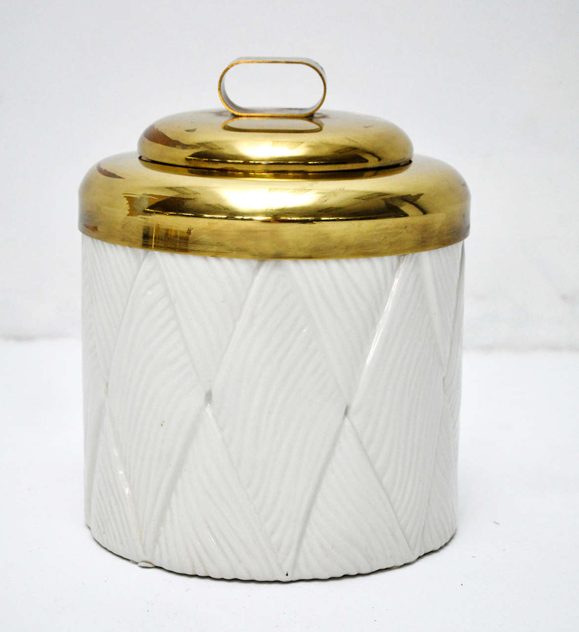 Ceramic and brass ice bucket by Tomasso Barbi.