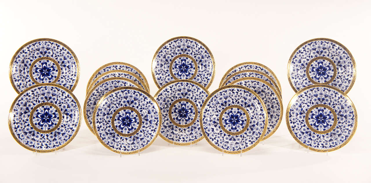 This 19th century Derby set of 12 porcelain soup bowls in the most desirable cobalt blue and white 