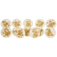 Twelve Copelands "Aesthetic Movement" Dessert Plates with Raised Paste Gold
