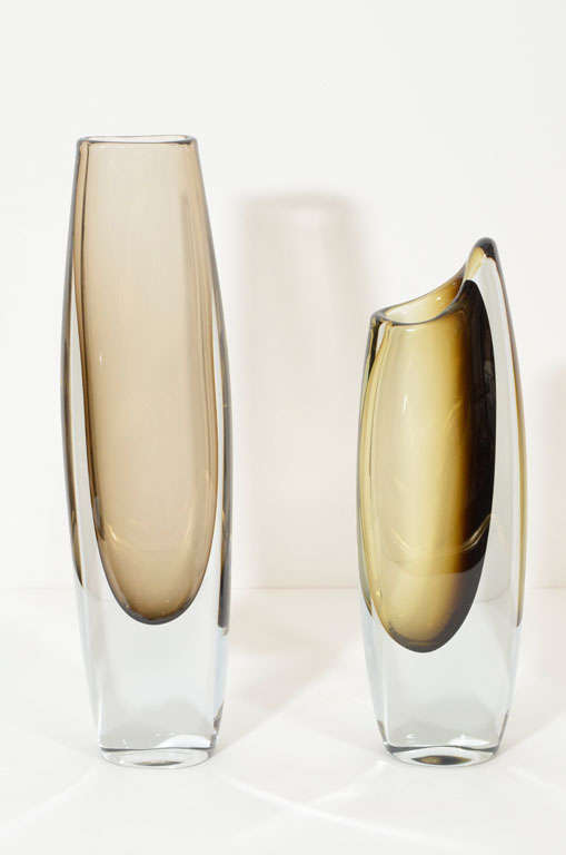 A pair of decorative, mid-century modern vases by Strombergshyttan, Sweden, circa 1950. Each vase is $950.
Tall vase is sold. Medium size vase is H 11'', L 3.75.