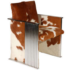 A Rare 1980s Cowhide and Fluted Chrome Club Chair