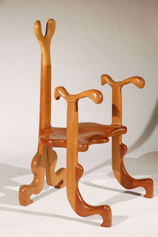 A Sculpted Mahogany Armchair by Tom R. Allen. USA, 1980s. A rare and sculptural armchair by California furniture maker Tom R. Allen. A whimsical and original form. Inscribed TOM R ALLEN. Good original condition.