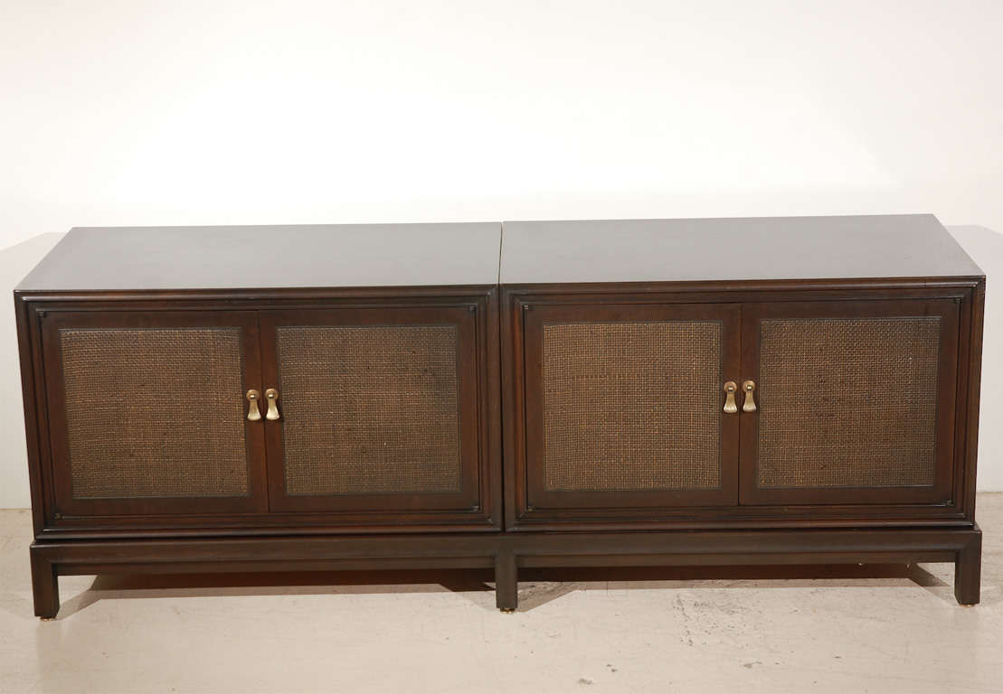 1960's cabinet by Mount Airy furniture company.  This lowboy cabinet has four doors and the case is two separate walnut boxes on one a solid walnut base.