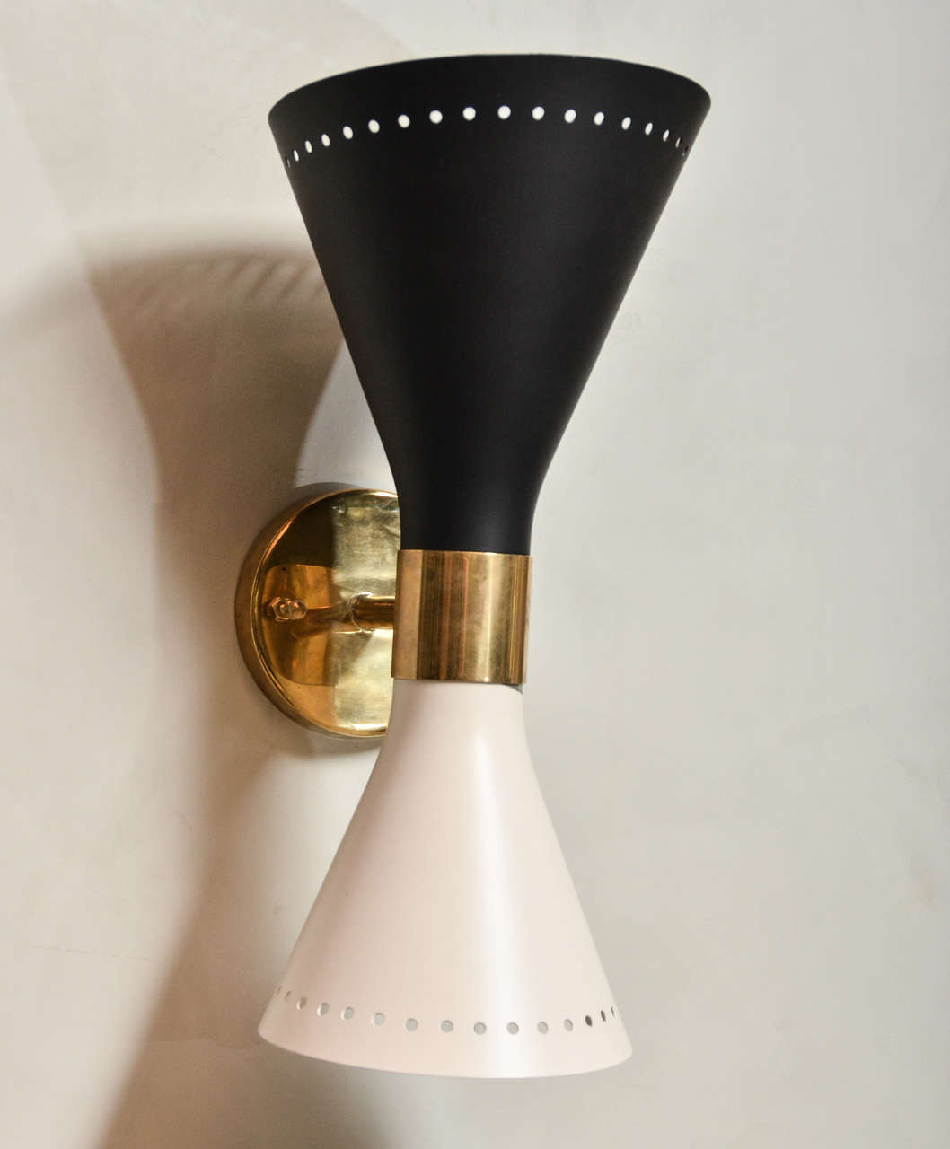Beautiful pair of Mid-Century italian Black and White sconces in the style of Stilnovo