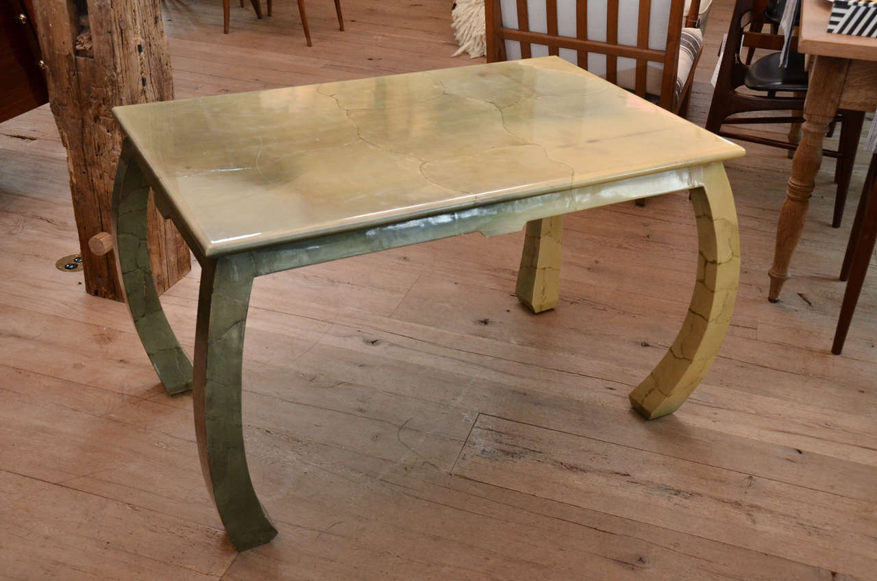 Stunning chartreuse green 1960s lacquered goatskin table in the manner of Karl Springer. Karl's pursuit of fine materials and old world finishing techniques gave his pieces their unique appeal.