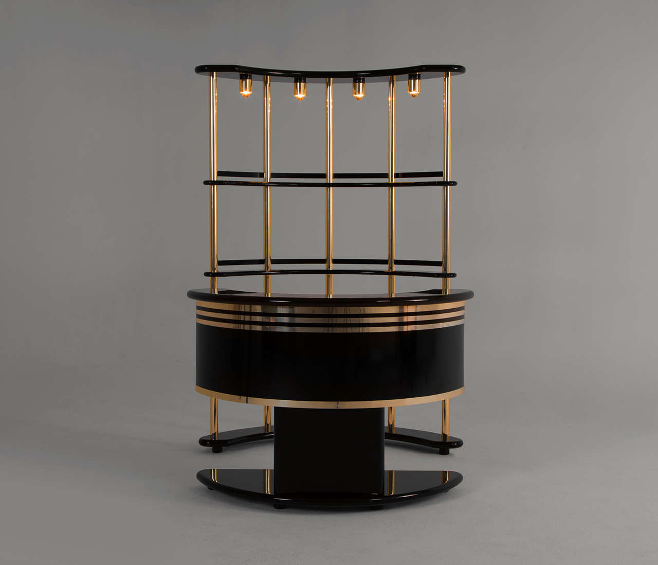 Very nice and complete dry bar with extra storage console.
This console, from which the lightning fittings are marked 'Guzzini', is equipped with extra lightning in the top to creates a very elegant look.

The dry bar itself has a small build in