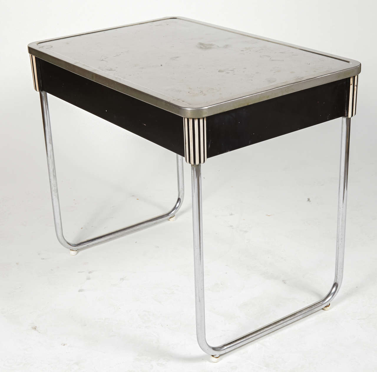 Original unrestored example of an important industrial design.
Fully signed design by Patten, retailed by the International Nickel Company. Patented design in 1933.

Featured in the Yale University permanent collection. Page 111, 