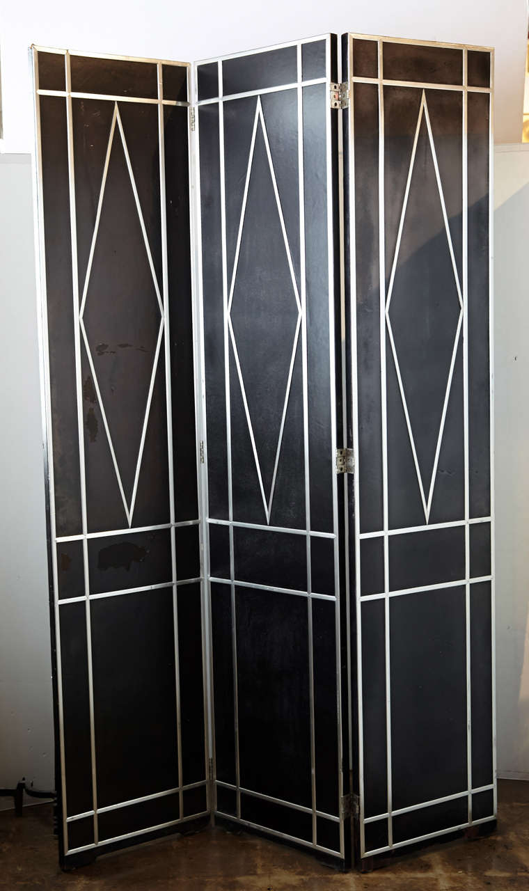 Cool pair of decorative geometric folding screens.
Likely 1970-1990 construction, purchased from a movie prop-house.

These are massive and heavy, with each individual hinged panel nearly 2' wide and over 6' tall.  The panels are finished on all