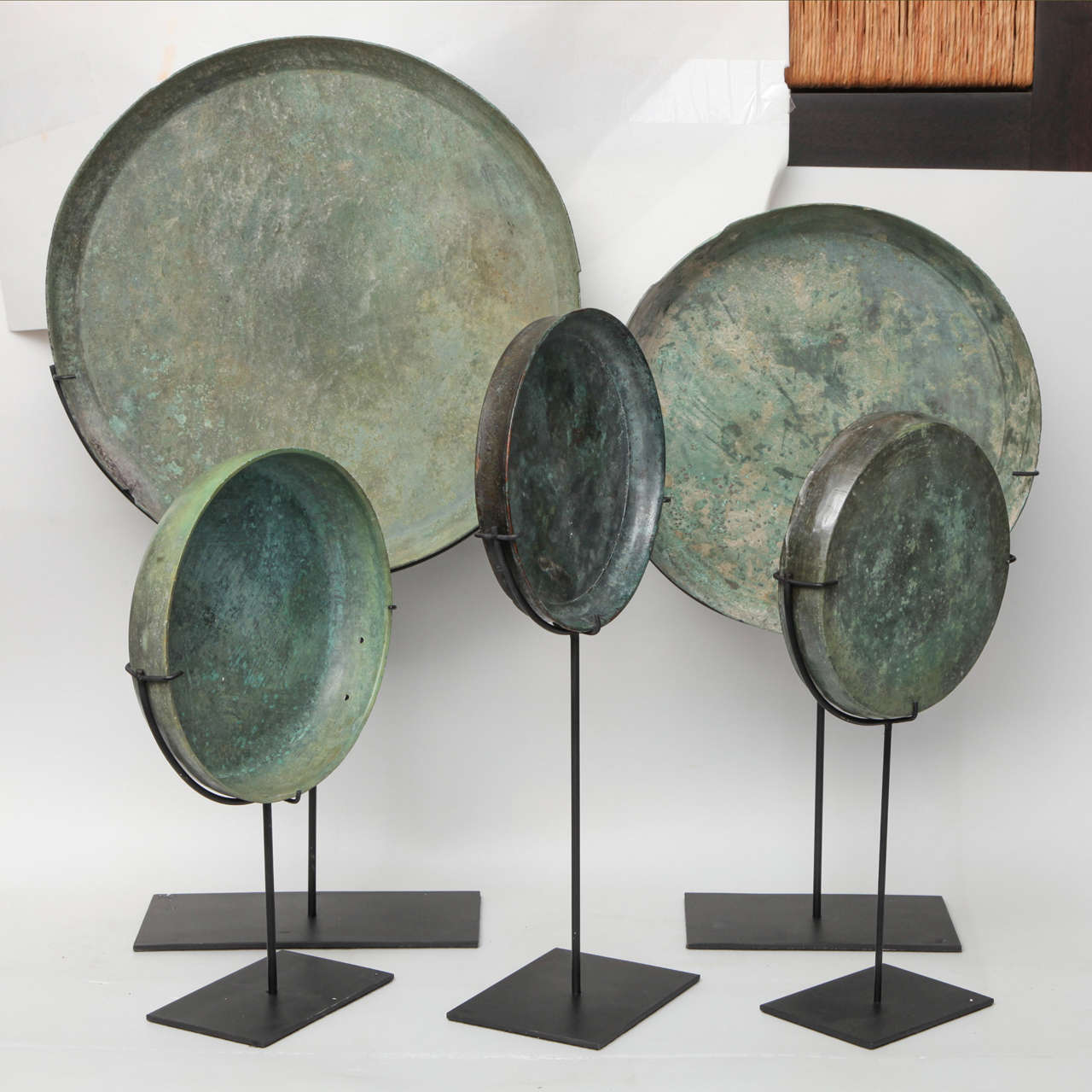 A selection of bronze trays from Thailand. On metal stands. Sizes vary. Priced and sold separately. Largest size and price shown below.