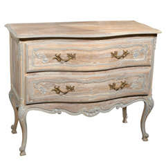 A French Two-Drawer Chest with Tall Cabriole Legs