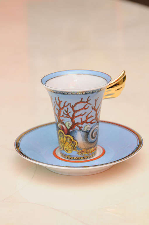 This beautiful vintage Italian Versace coffee/tea service set is marked on the bottom in french ... in english translates to the gifts of the sea.. it is gloriously fired and hand painted in beautiful colors of periwinkle coral, red, yellow,