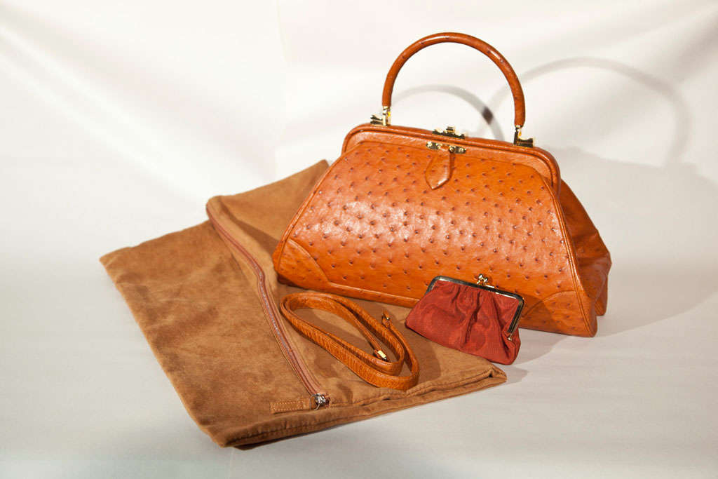 Judith Leiber Signature Satchel boasting ostrich skin surround. Debuts with coin purse, strap and custom pouch. Color is more subtle & quite opulent in person'