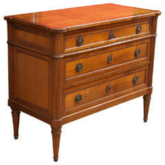 A Louis XVI style fruitwood commode