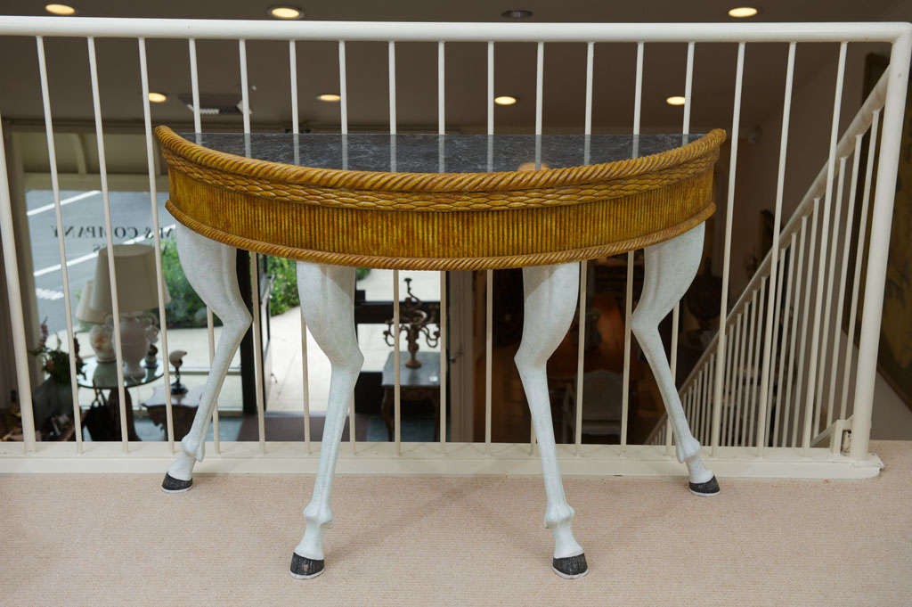 A pair of painted console tables