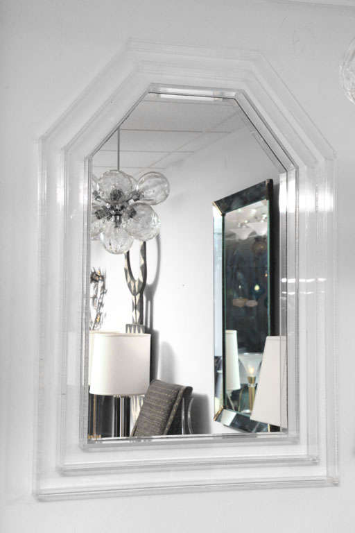 Chunky substantial Lucite mirror.