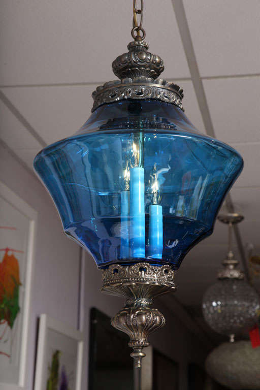 Blue chandelier pendant in Azul blue, France, delicate metalwork. Like the ocean in Nice.
Rewired and restored.
