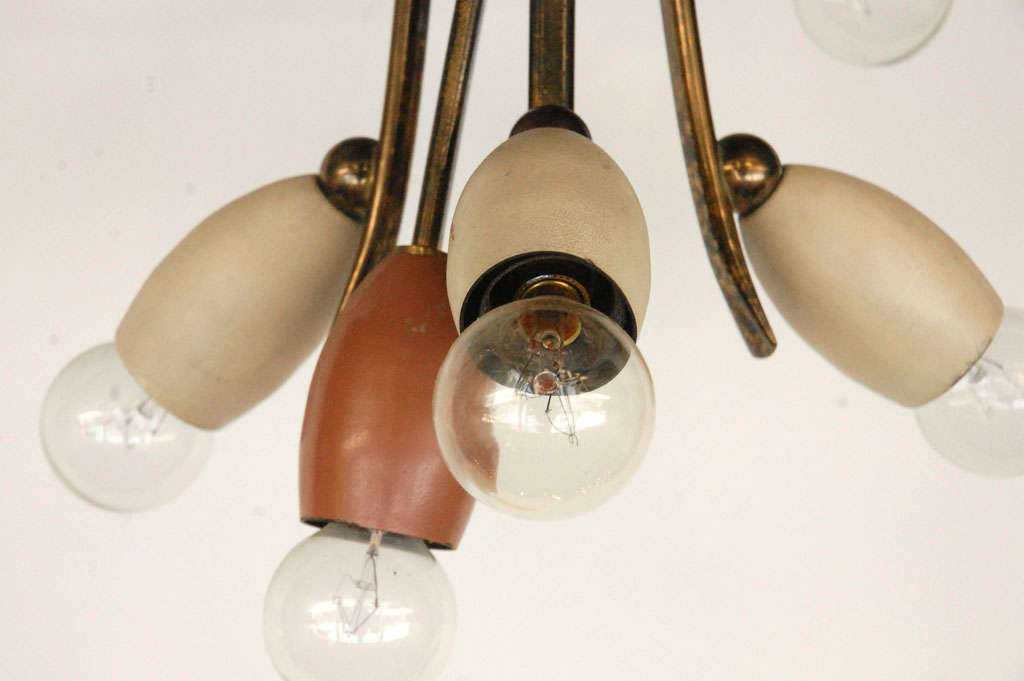 an elegant stilnovo ceiling pendant with ten fantastic bulb shaped lights.