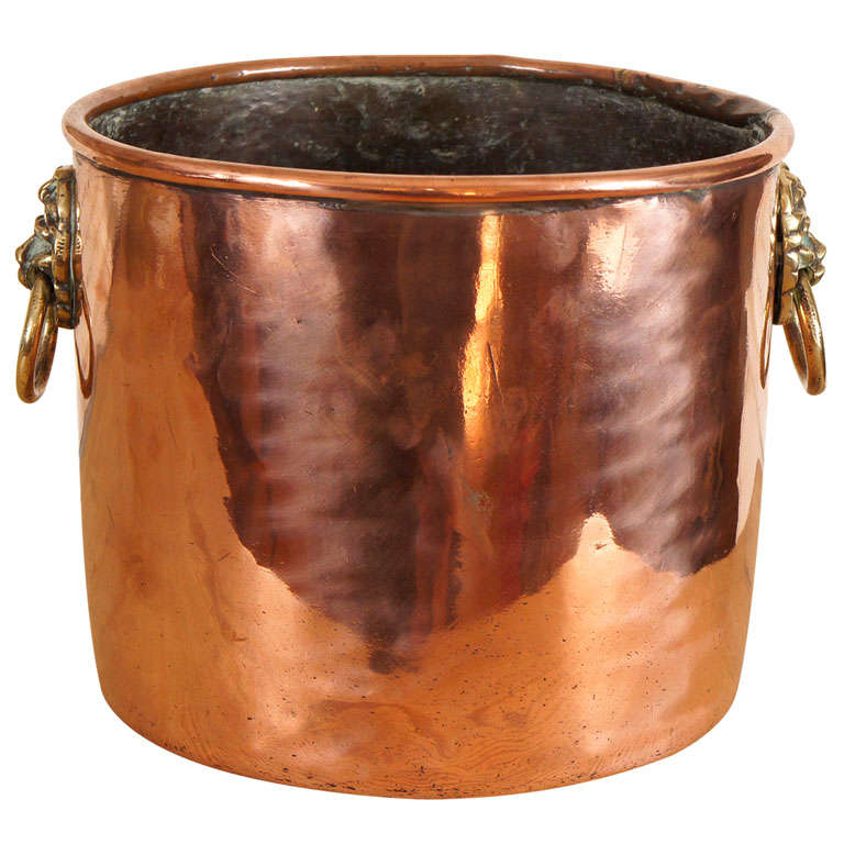 English Copper pitcher with lion
s head handles