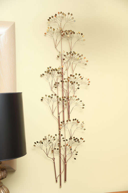 SOLD SEPT 2012 From 1973, this signed C. Jeré wall sculpture stand of trees has wonderful shimmering leaves and a great narrow scale making it quite versatile.  An early work, quite nice, excellent condition.  Lovely Jere work.