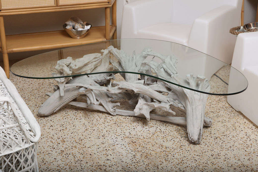 An unusual, vintage-Florida, curved driftwood coffee table with a boomerang glass top. Original white-washed finish keeps it bright and beachy!