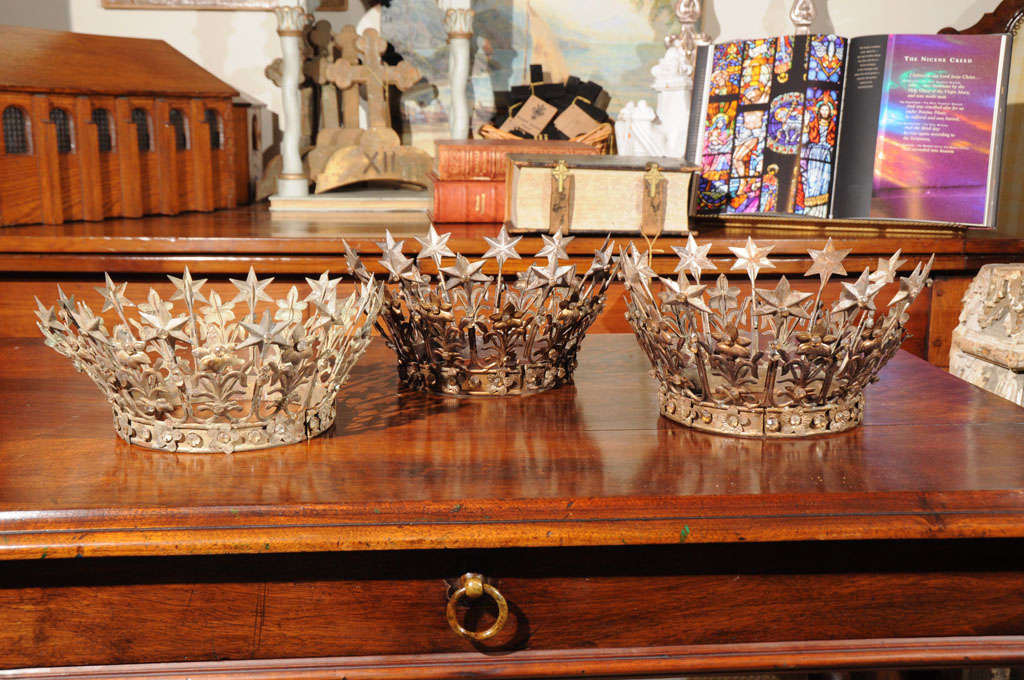 These sacred crowns are beautiful religious relics from France dating back to the early 1800’s. They could have been used on statues of the Madonna, the Infant of Prague or in religious parades and ceremonies. As a modern day decorative item, one