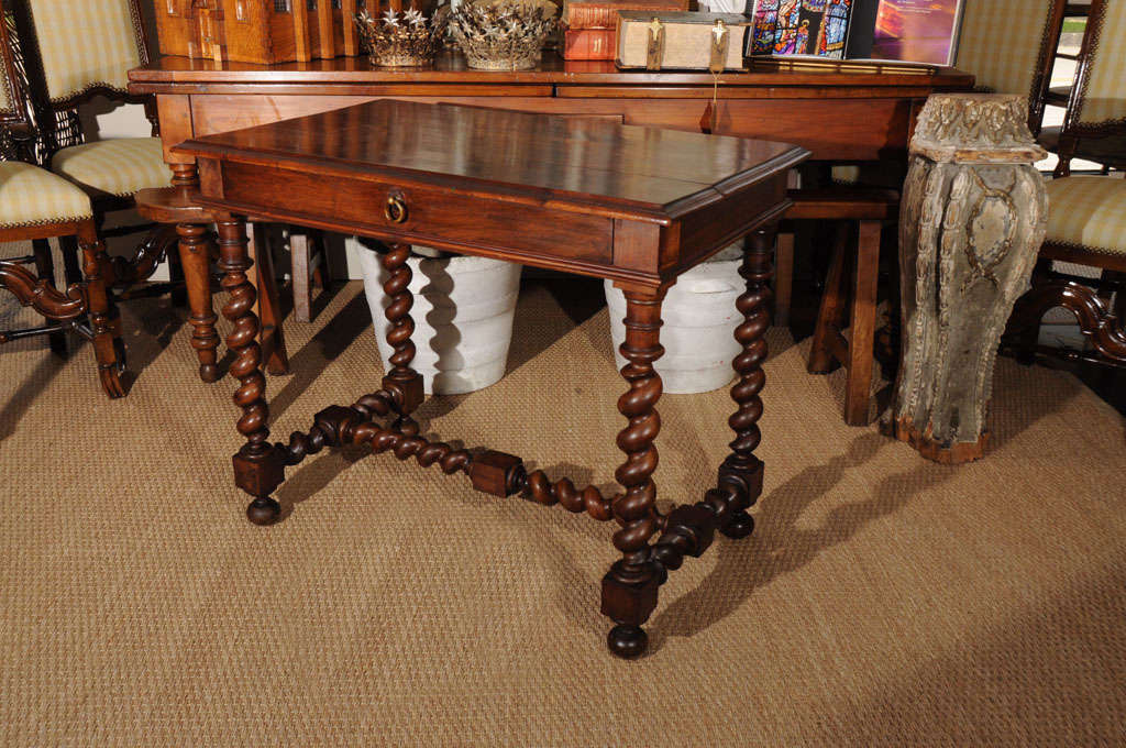 The Barley Twist leg is such a strapping detail. It’s very burly, yet there is something about the curvy lines that make softer its appearance. This walnut table with stretcher base has a beautiful patina and is at home next to a sofa, bed, or