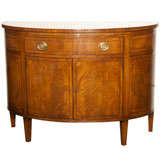 Demilune cabinet
