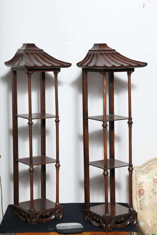 Lovely pair of hand carved pagoda etageres.