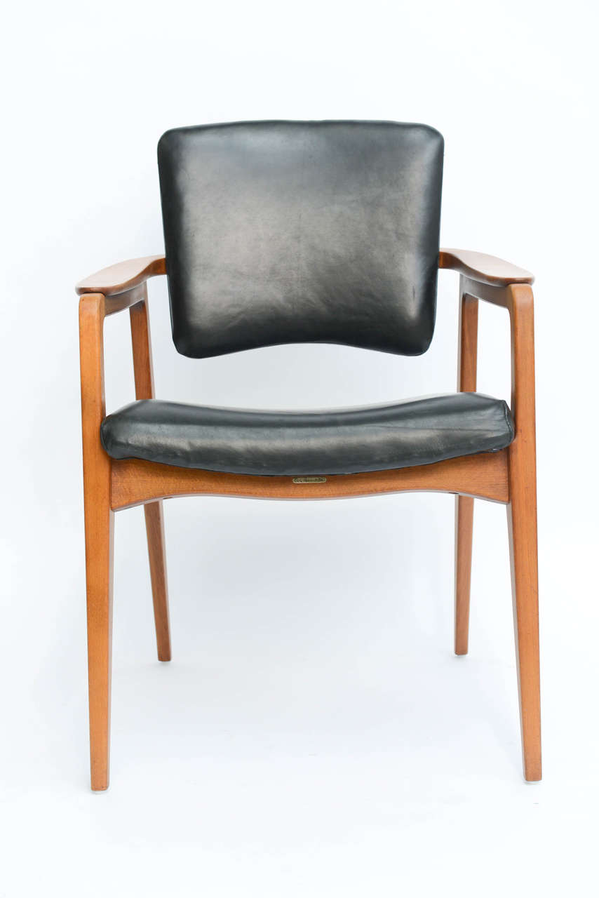Design by noted Swedish Industrial designer Count Sigvard Bernadotte for Denmark's France & Daverkosen (later France & Sons) in the 1950s. Exceptional self adjusting backrest, the chair is quite comfortable as well as beautiful. Teak and leather.