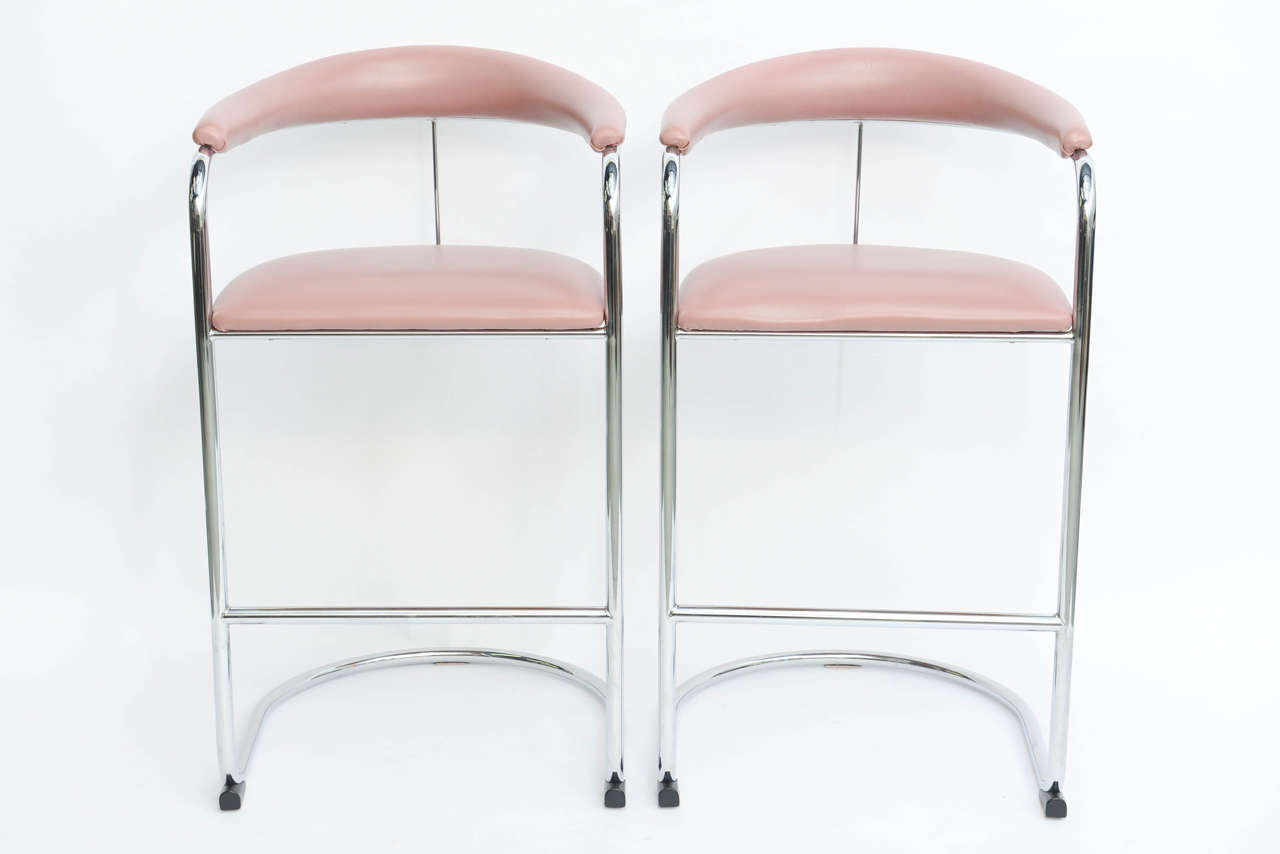 SOLD  Great Anton Lorenz early 1930s design no. SS33 as barstools, made by Thonet. Tubular chrome with upholstered seat and arm or back. Original plum vinyl ready for an update. Wide and comfortable.

Price is for the set of four.
        