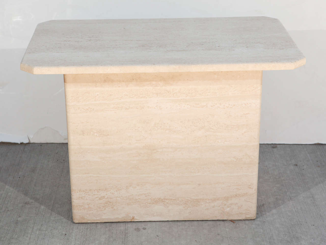 Pair of polished travertine top and base table.