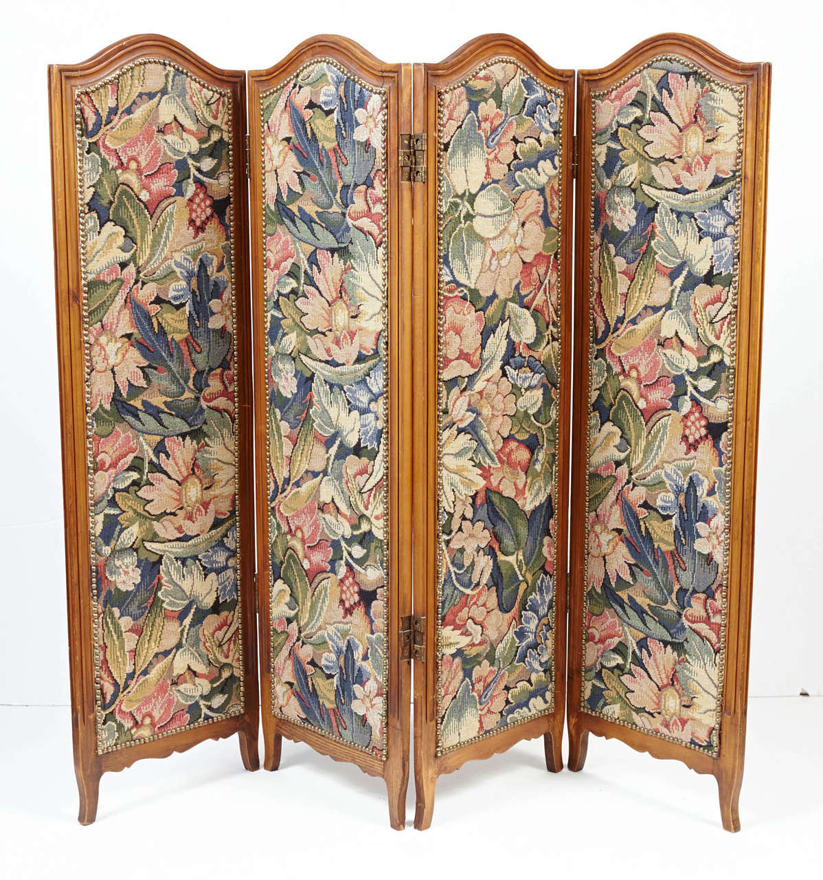 Small Provincial folding screen with 4 arch-top panels with short cabriole legs inset with floral tapestry.