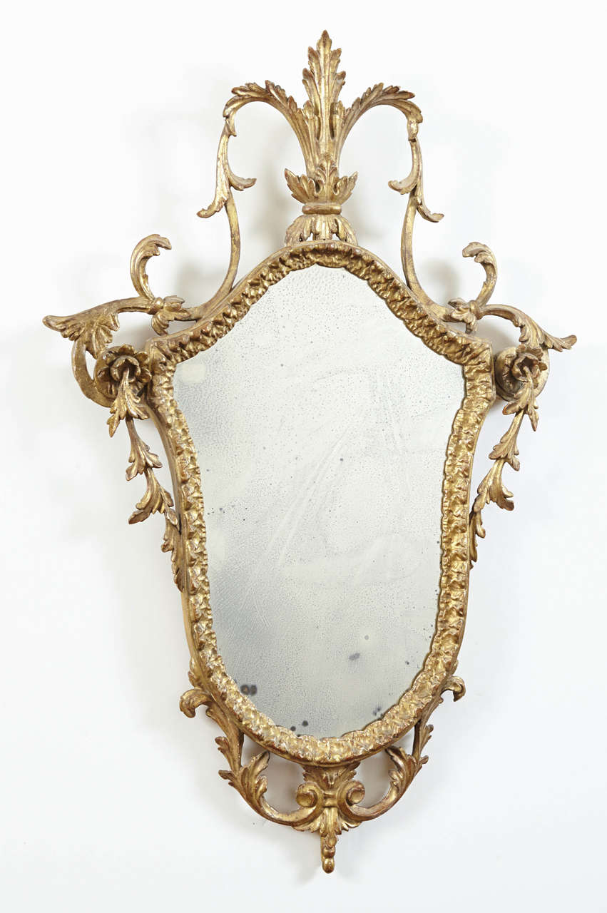 Small English Adam style gilt mirror.