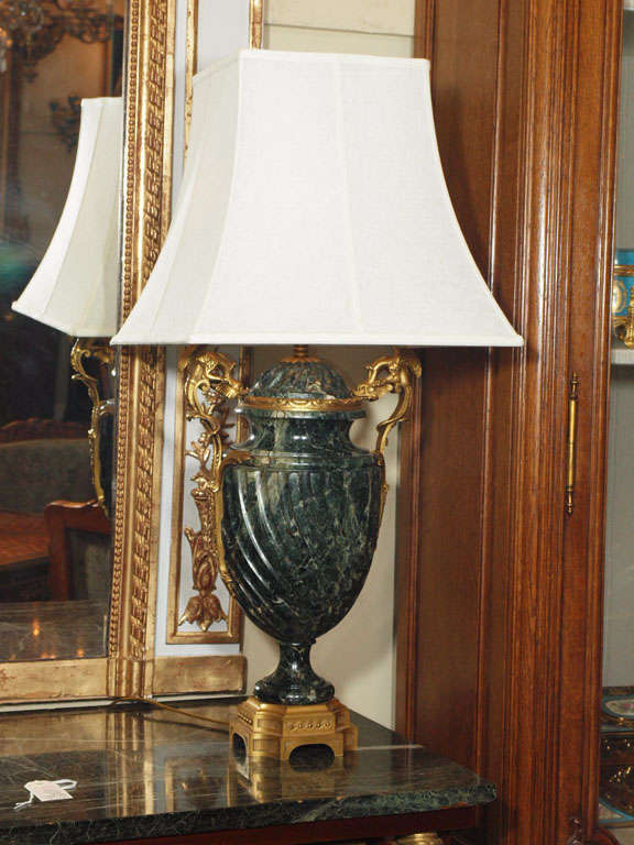 These handsome lamps are striking and would make an excellent addition to any home or professional office. 