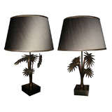 a pair of lamps in bronze with 4 palm leaves
