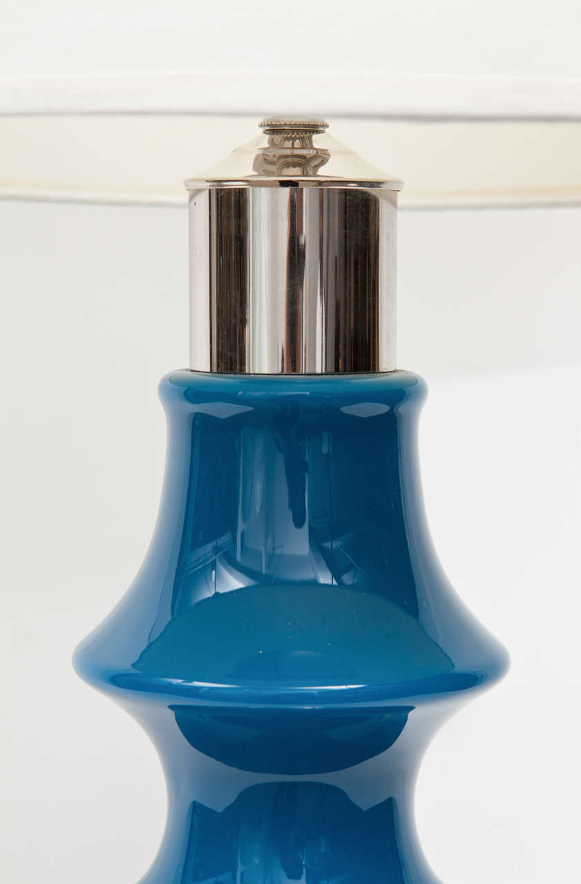 Fantastic pair of Swedish cobalt glazed ceramic totem lamps on polished chrome bases. Base diameter is 8