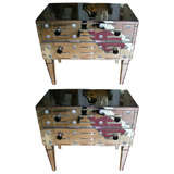 Pair of commodes in mirror .