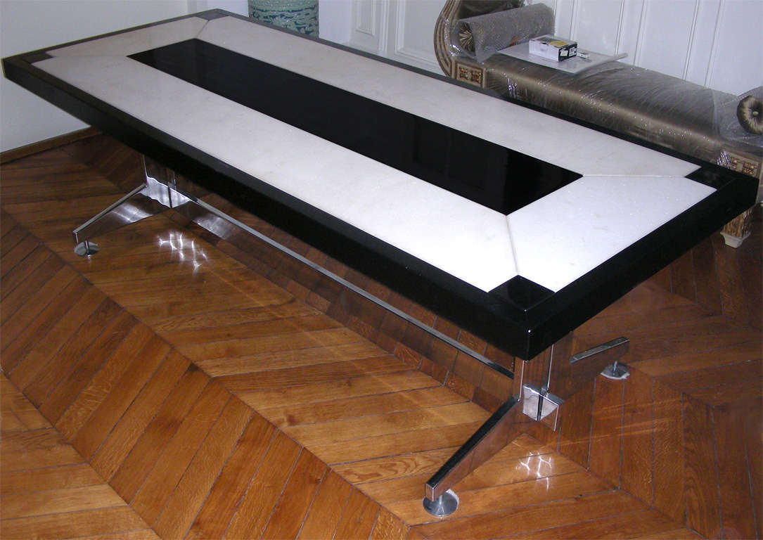 an extraordinary massive dining conference table
made of heavy steel and  ebonised walnut and  crystal marble.