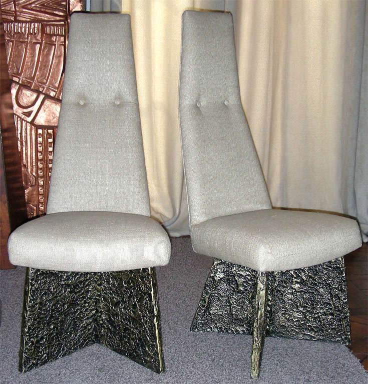 A set of six impressive brutal style period  dining chairs ,
Fully reupholstered with  a very thick raw silk fabric-
The base  of an x shaped base made of wood covered with brutal style atomic bronze cast resine with a rich dark bronze patina
Two of