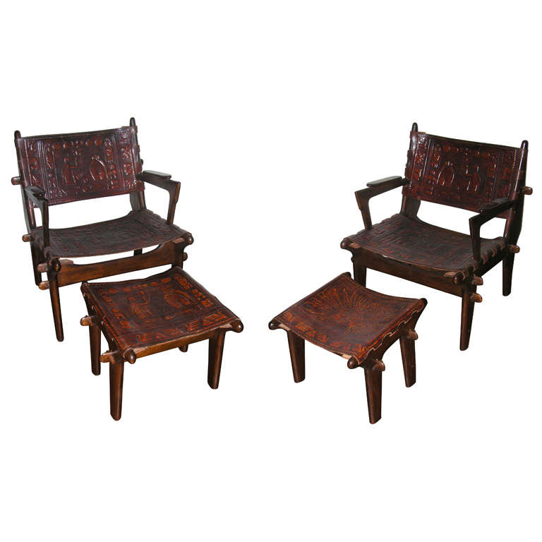 Set of Two Scandinavian Chairs and Ottomans with Embossed Leather circa 1960 For Sale