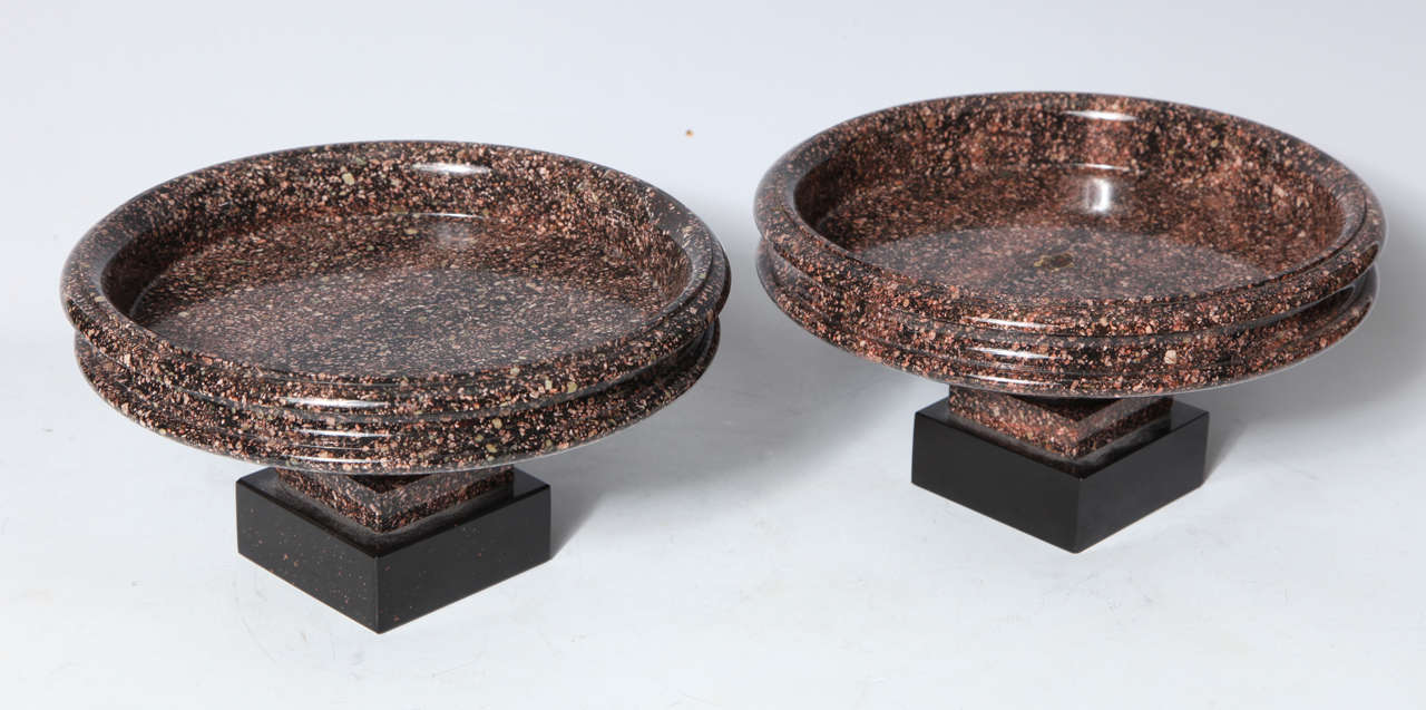 A Pair of Unique Neo-Classical period Swedish Porphyry Tazzas mounted on square shaped Belguim black marble bases. Made as mantle or console table decorations these elegantly crafted tazzas would fulllfill the same role today