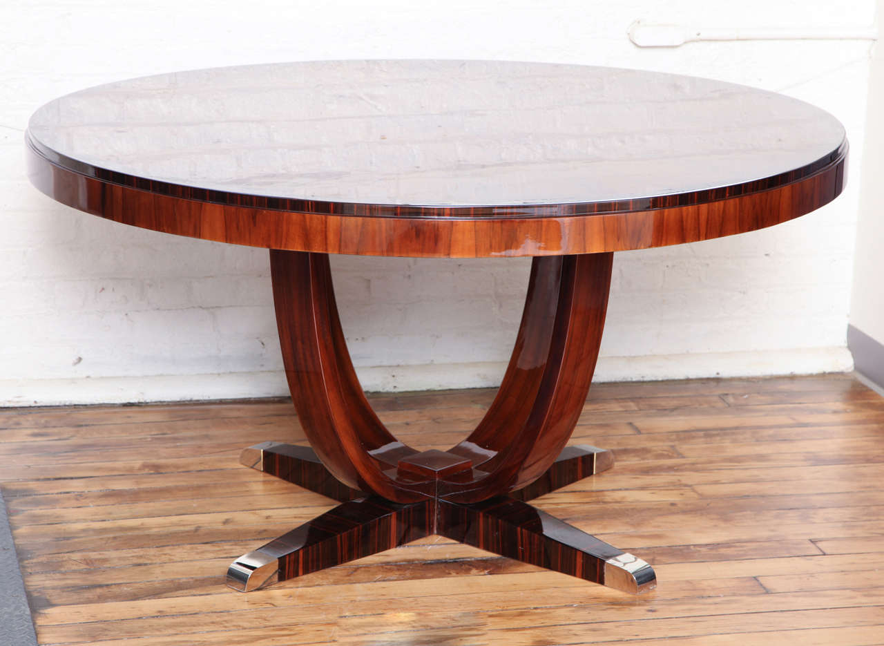 Fabulous Art Deco Round Dining Table with sunburst inlayed black forest walnut and macassar ebony banding top and legs. 