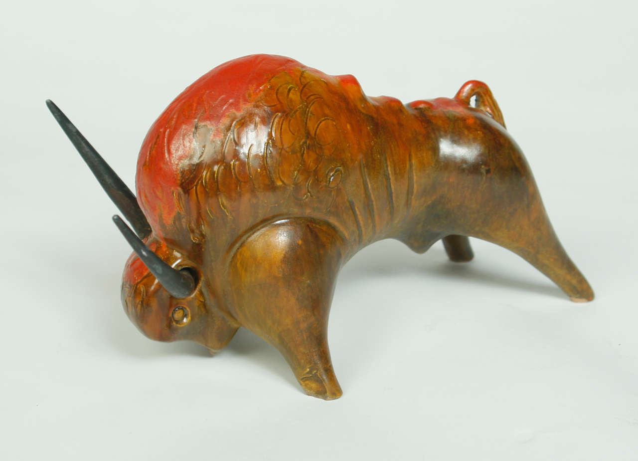 Large ceramic Raymor Bull with tri-color glaze with brass horns. Nothing says you're the boss more than having this on your desk.