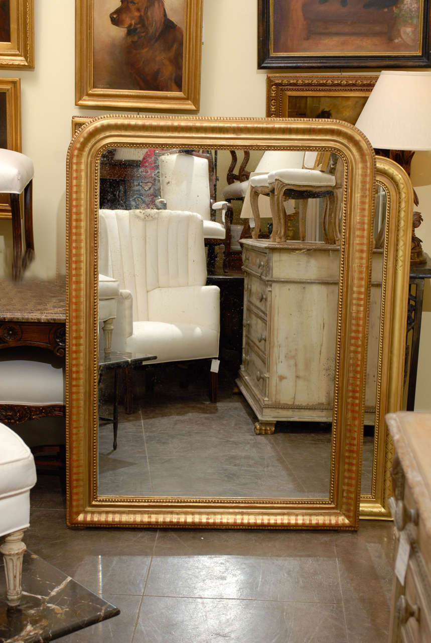 Large French gilt Louis Philippe style mirror with nice detail.