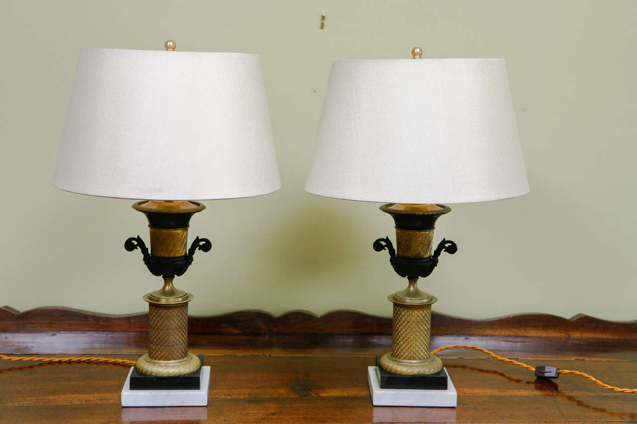 Pair of Gilt and Patinated Bronze Second Empire Urns, c. 1860, now mounted as lamps with custom silk shades