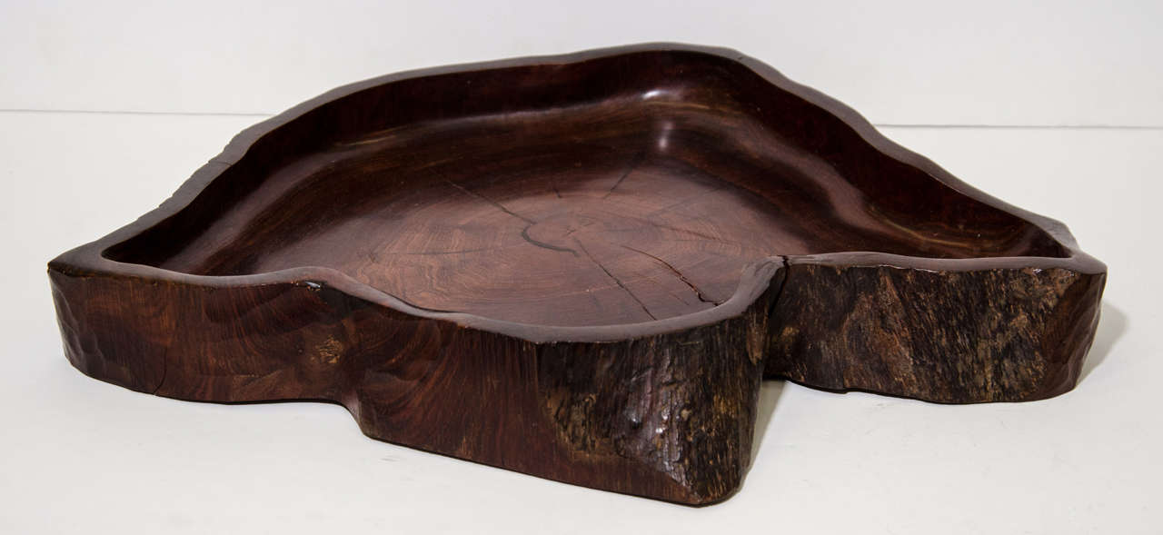 Made during the 1970’s in Brazil. It is hand carved from a Brazilian hardwood known as “Pau-ferro” which means iron wood from a specific type of Jacaranda tree. The larger size of the bowl is very rare as most are smaller.  It meaures approximately